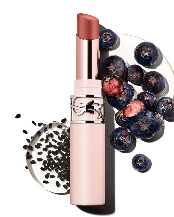 YSL LOVENUDE Lip Blusher in Shade 4, opened, with blueberries and black seeds, highlighting natural ingredients.