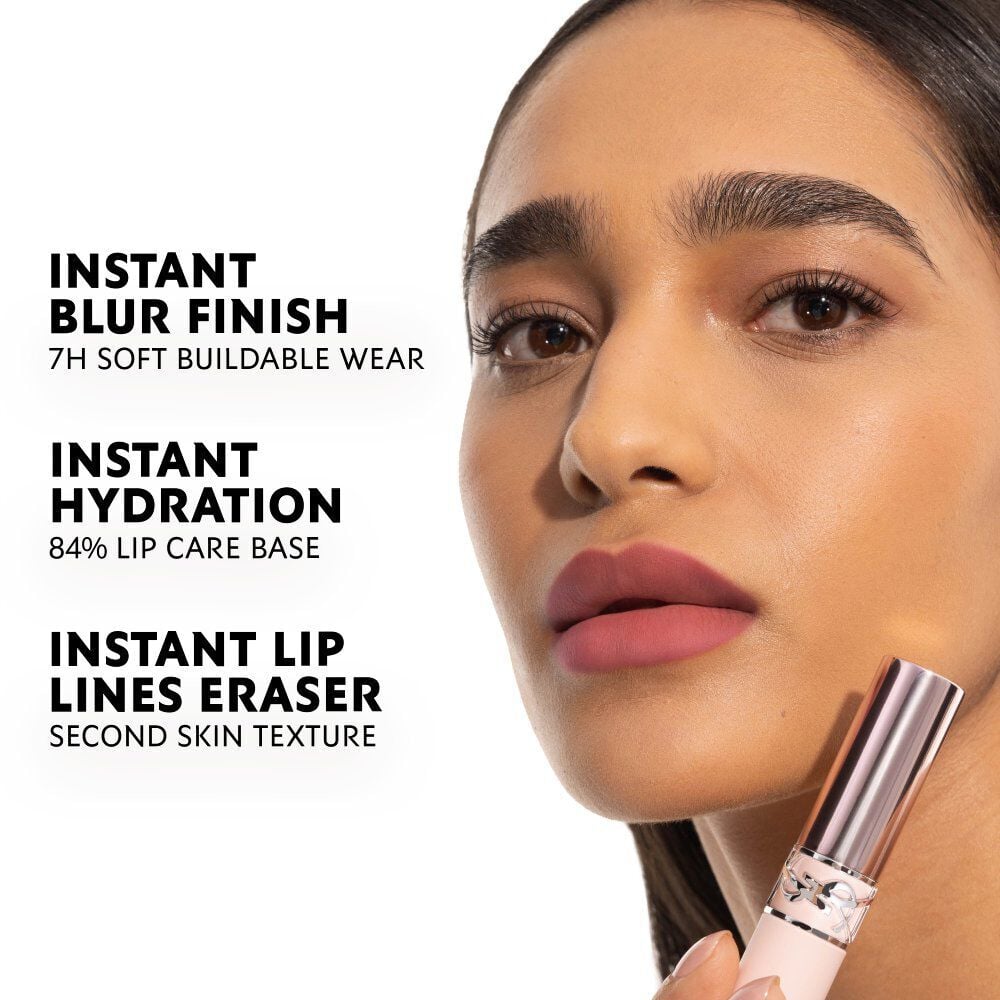 Model wearing YSL LOVENUDE LIP BLUSHER with soft blurred matte nude lip finish.