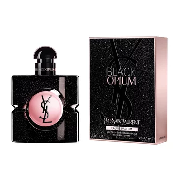 Black Opium Eau de Parfum bottle next to its matching black glittery box featuring the YSL Cassandre.