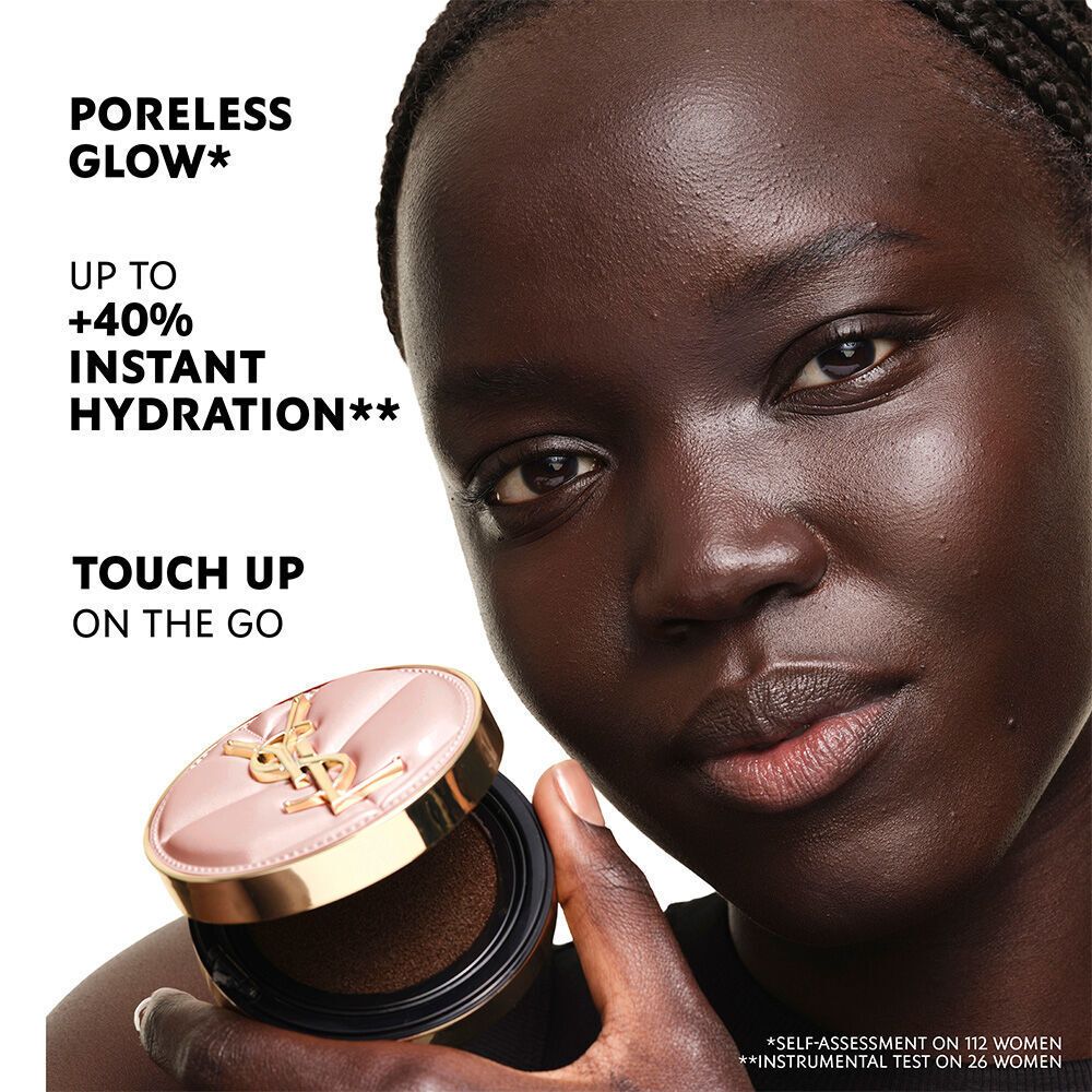 Model with deep skin holding YSL SKIN AFFAIR SOFT GLOW CUSHION. Poreless glow, +40% hydration and on-the-go touch ups.