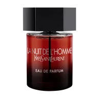 The Bottle front-facing shot of the La Nuit de l’Homme Eau de Parfum bottle, featuring a deep red-to-black gradient glass and a signature matte black hexagonal cap.