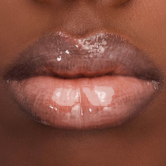 Model lips wearing YSL Loveshine Lip Oil Gloss in 11 Radiant Glass