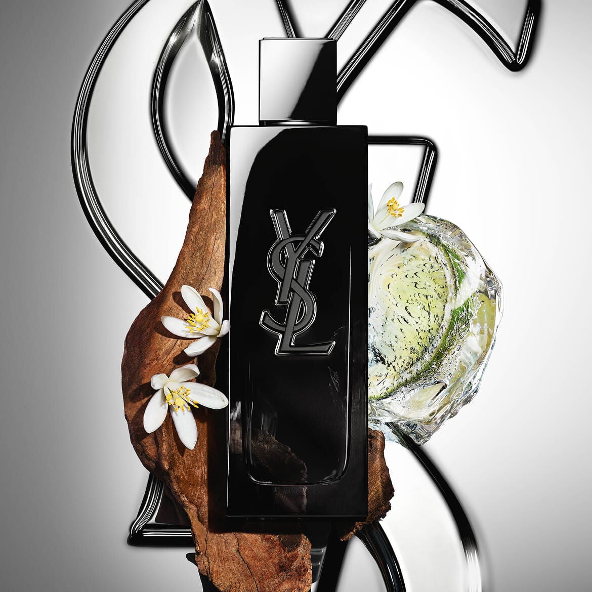  MYSLF Eau de Parfum bottle by YSL Beauty surrounded by fresh bergamot, orange blossom and
    woods.