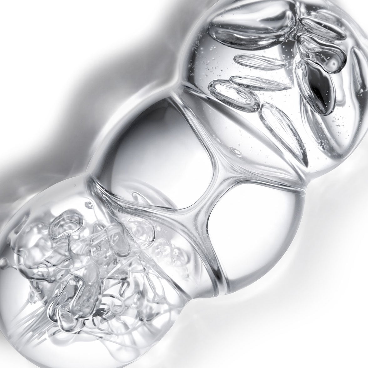 YSL Beauty Pure Shots Youth Reload complex, depicted as three interconnected, clear spheres.
